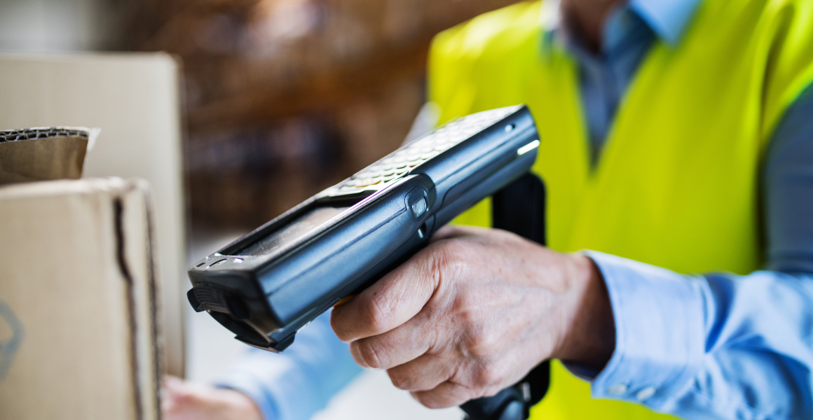 Warehouse team performing inventory counting using barcode scanners to validate stock and ensure data accuracy.