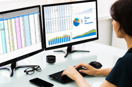 Logistics manager replacing Excel spreadsheets with a digital warehouse management dashboard.